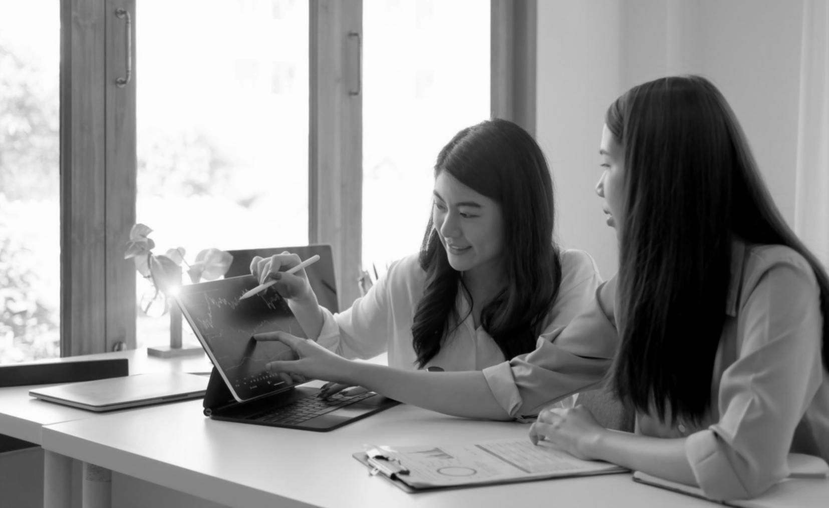 Team collaborating on startup funding strategy in modern workspace